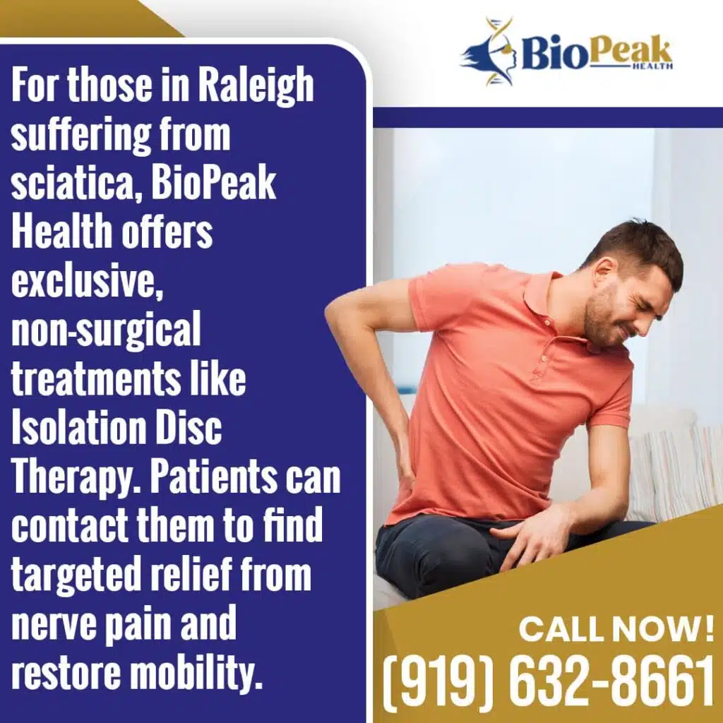 Man in pain with sciatica holding his lower back, representing BioPeak Health's non-surgical treatments for sciatic nerve pain in Raleigh, NC.