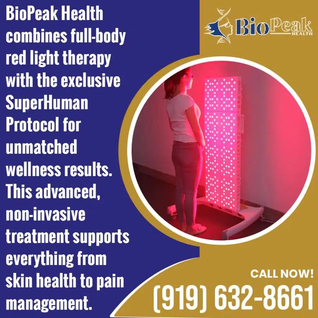 A client using a full-body red light therapy chamber as part of BioPeak Health’s SuperHuman Protocol for skin health and pain management.
